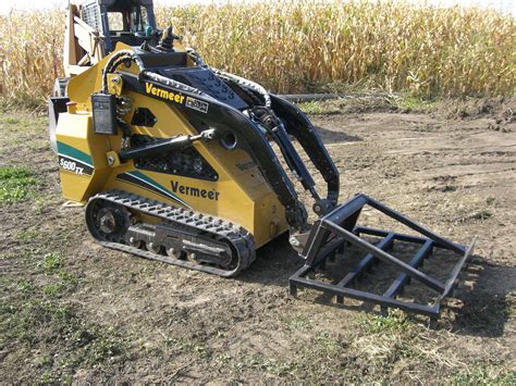 how to change attachments on case skid steer|landscape attachments for skid steer.